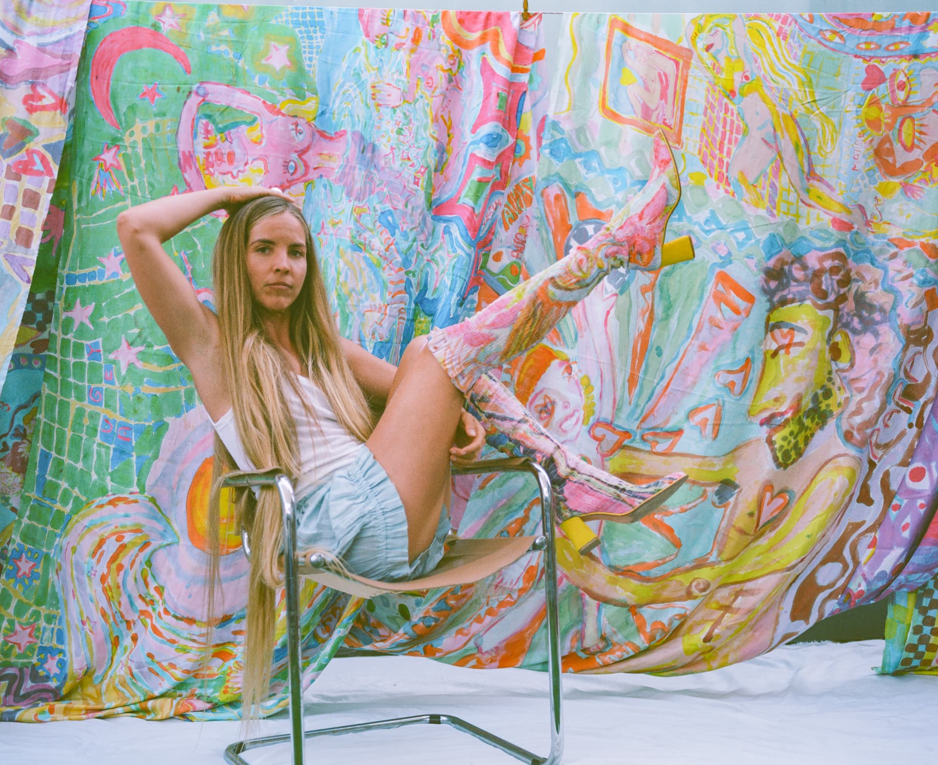 Hand-painted silk boots by Florencia Montefalcone